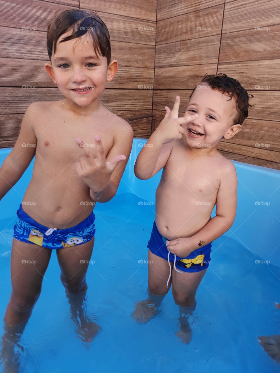 little cousins ​​playing in the pool so much joy and love