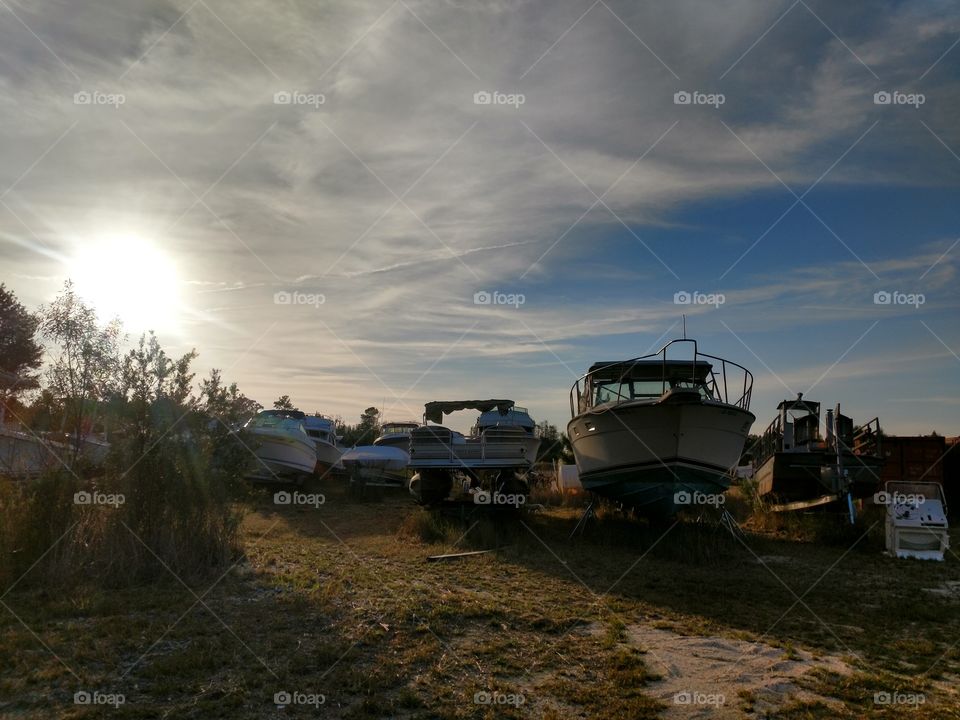 boats, land, graveyard, field