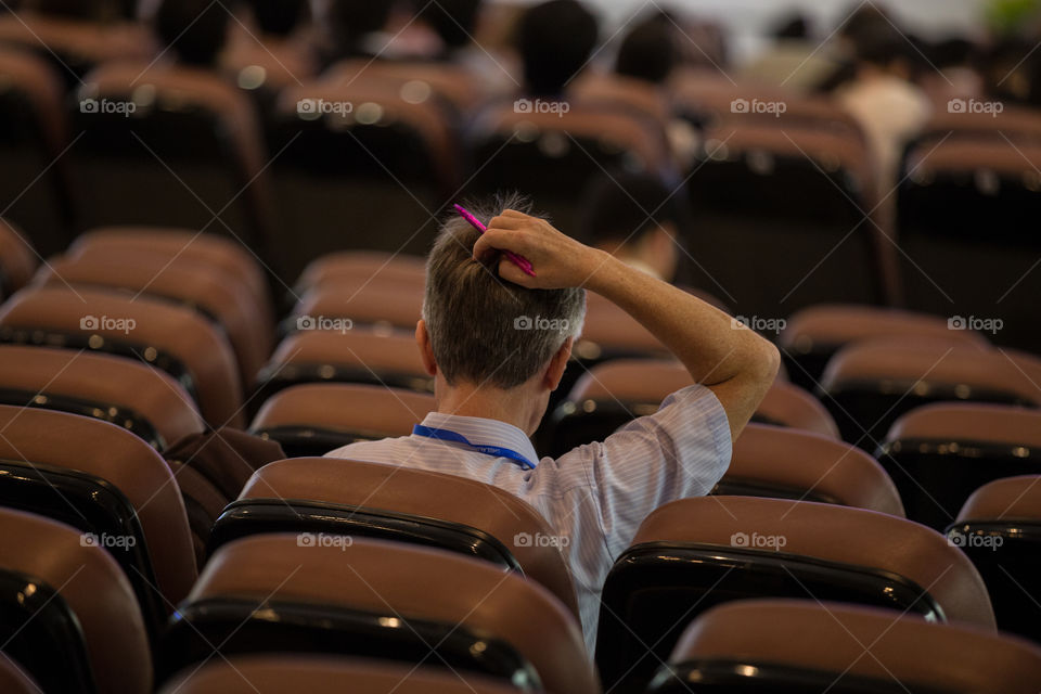 Man confused while in the conference room