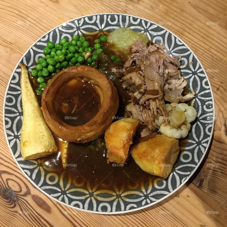 Sunday Roast Pork, apple sauce, parsnip, peas, cauliflower, roast potato and Yorkshire Pudding .. minus one parsnip as I started to eat my dinner before I snapped the photo 😂