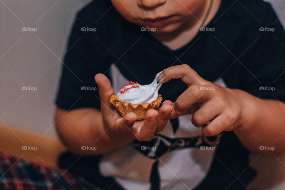 boy eats cake