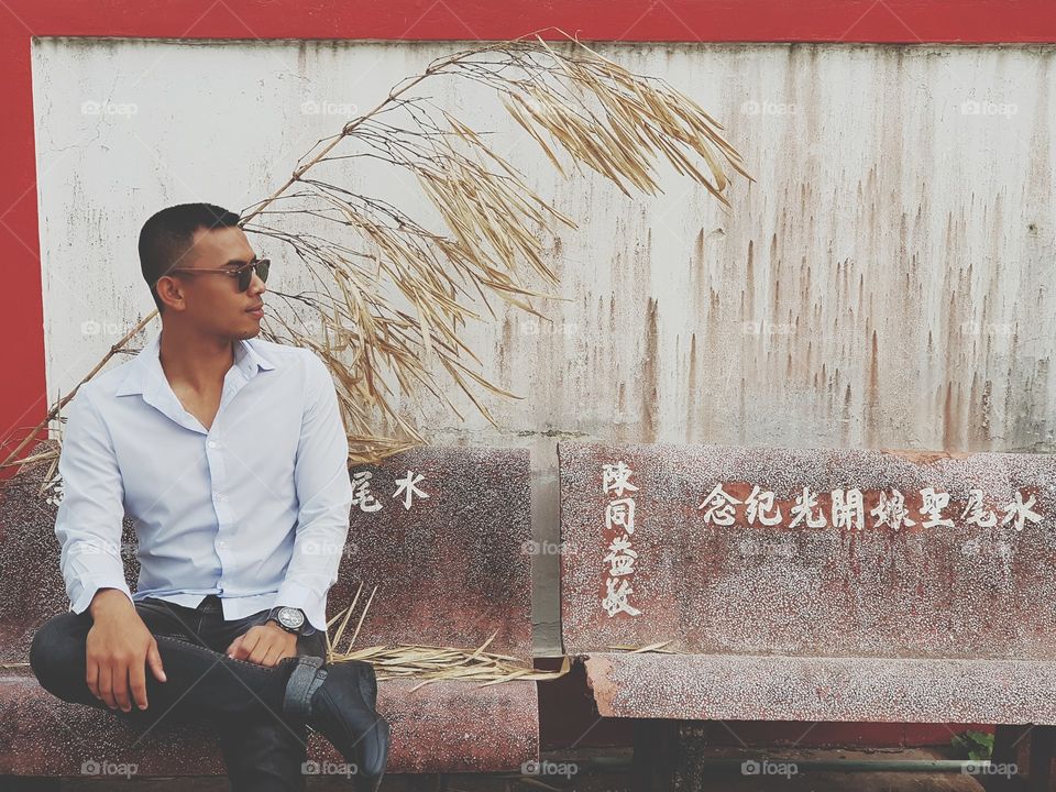 Man sitting on bench