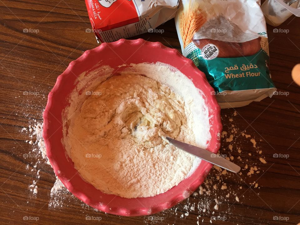 Mix the ingredients to make pizza