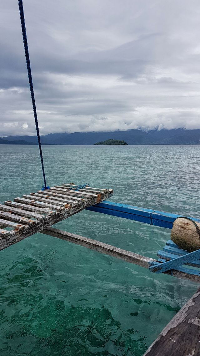 boat ride going to an island in Mati City, Philippines