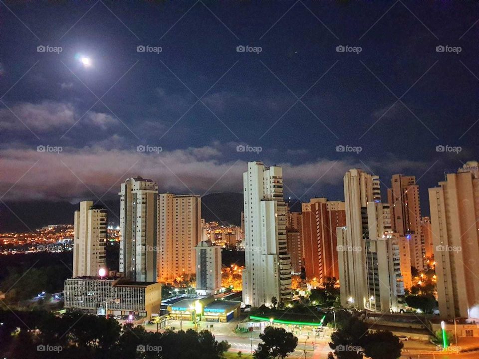 City#night#buildings#clouds#lights