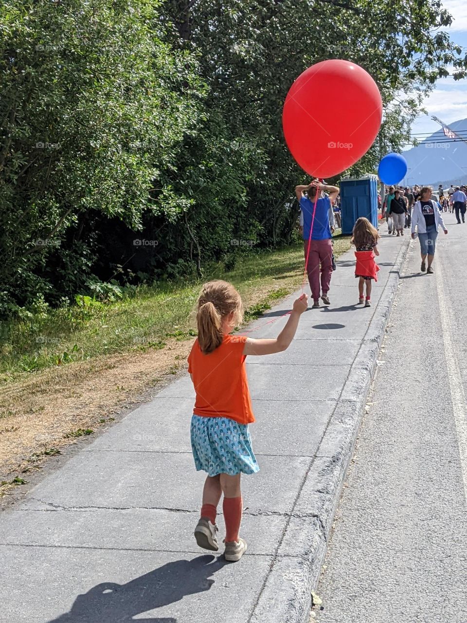 Girl with a balloon during festivities