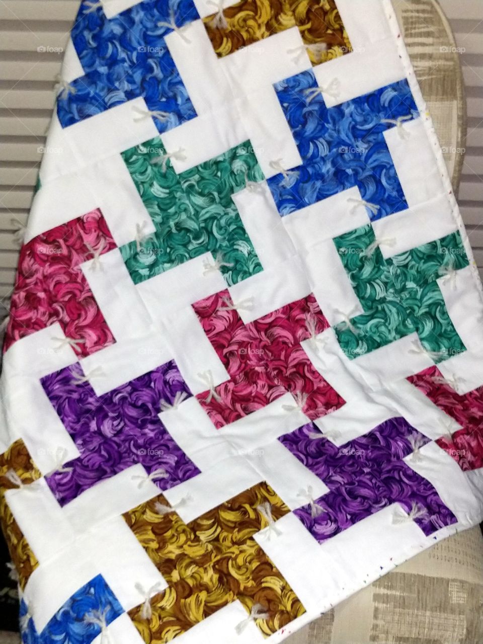 L pattern lap quilt