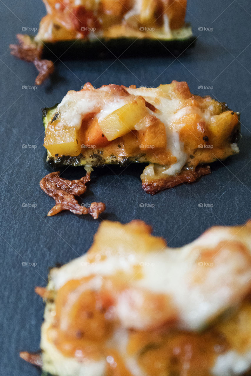 Zucchini over bake with vegetables and cheese