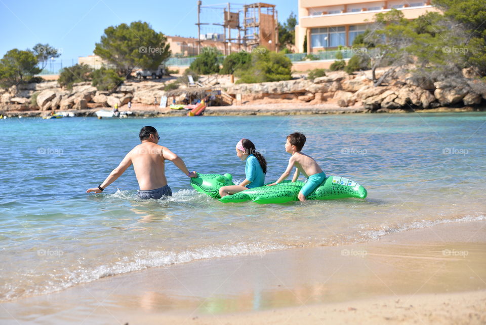 Children playing at the beach