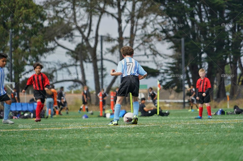 Young Boys Playing Soccer