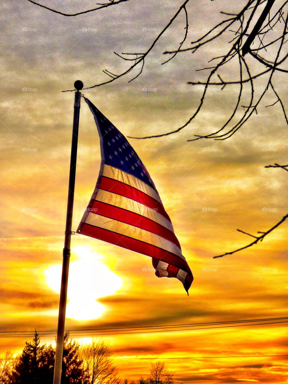 American flag at sunset
