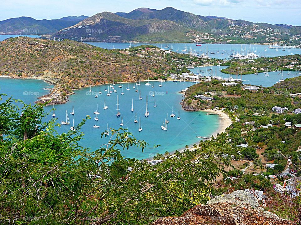 English Harbour,
A natural harbour and settlement on the island of Antigua in the Caribbean. English Harbour is on the south-eastern coast and famed for its protected shelter during violent storms. 