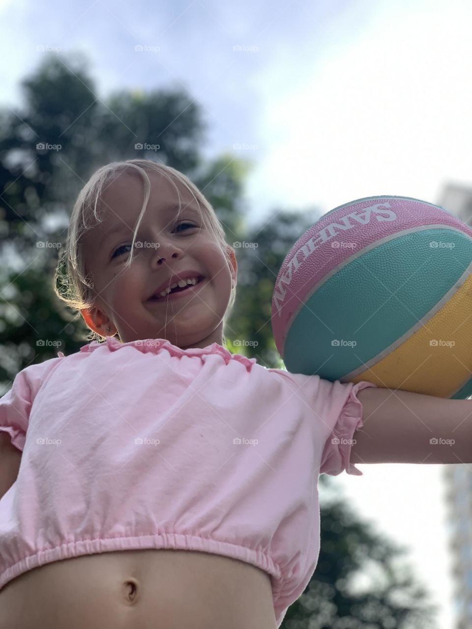 Cute girl with ball