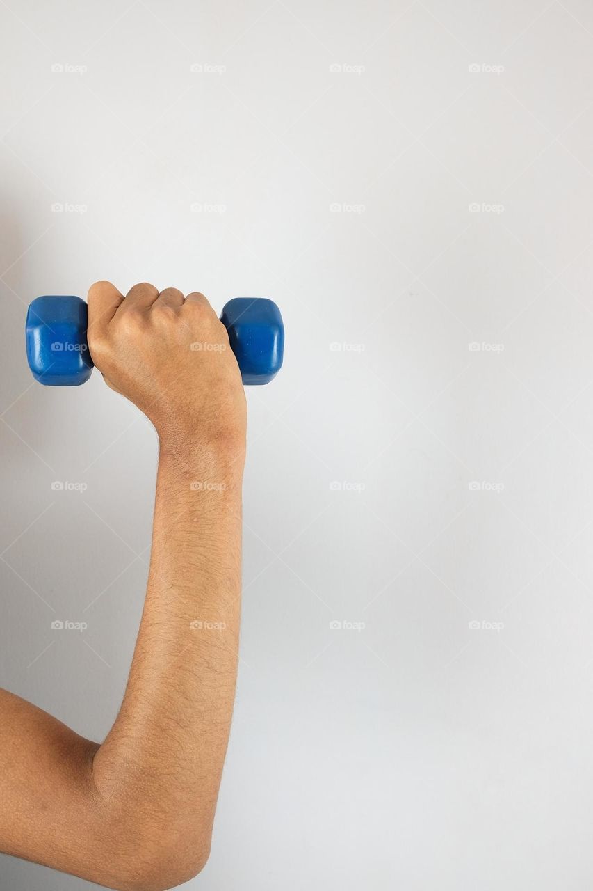 Dumbbells to exercise the arm. Gym article. Arm exercises