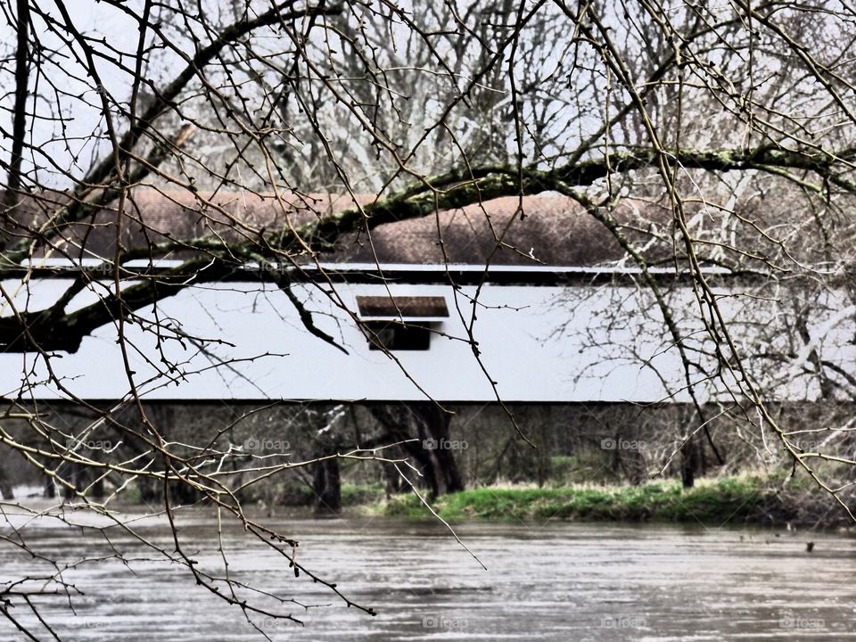 Indiana covered bridge on the river. 