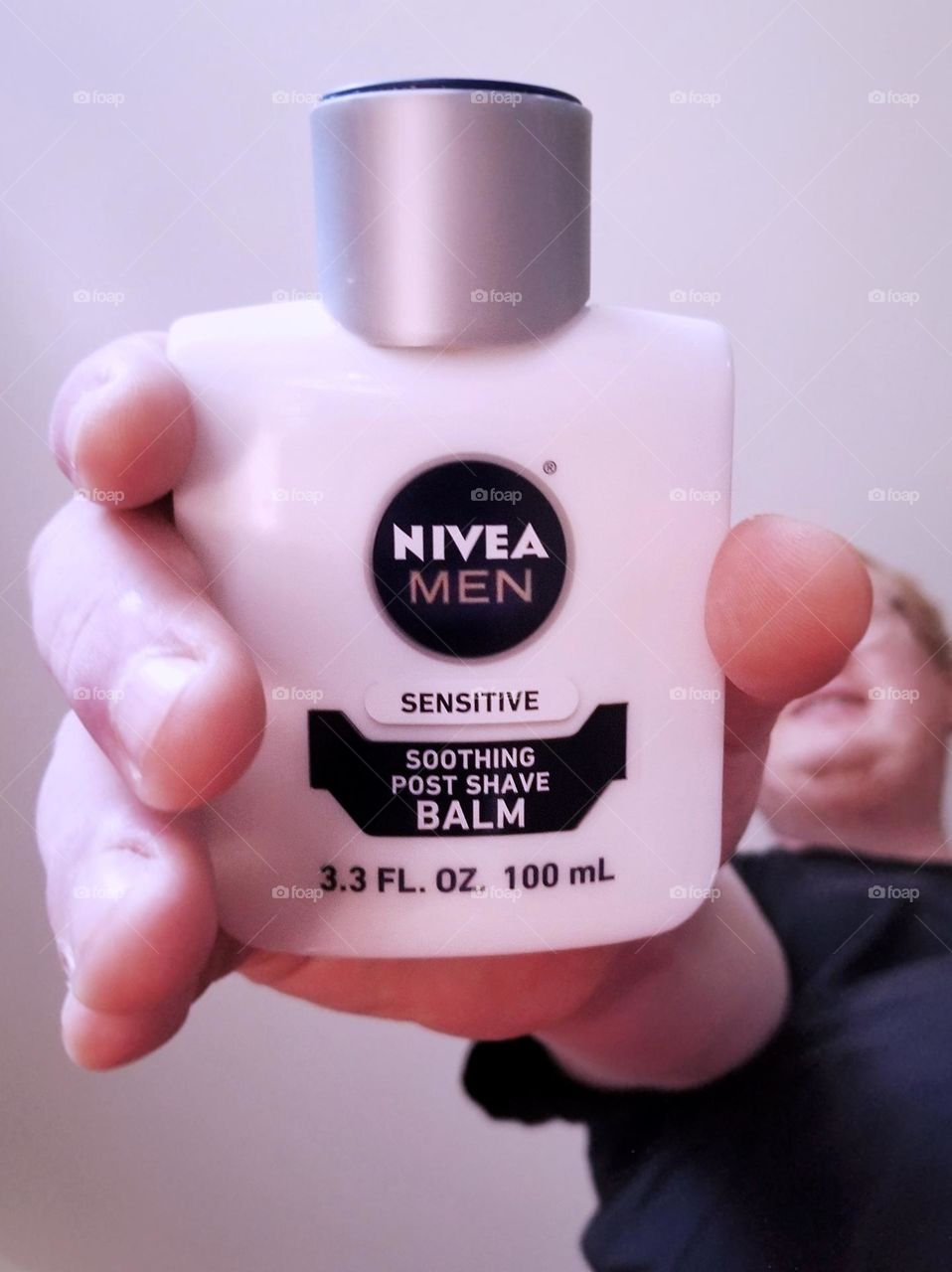 Close up of a Man's Hand Holding Nivea