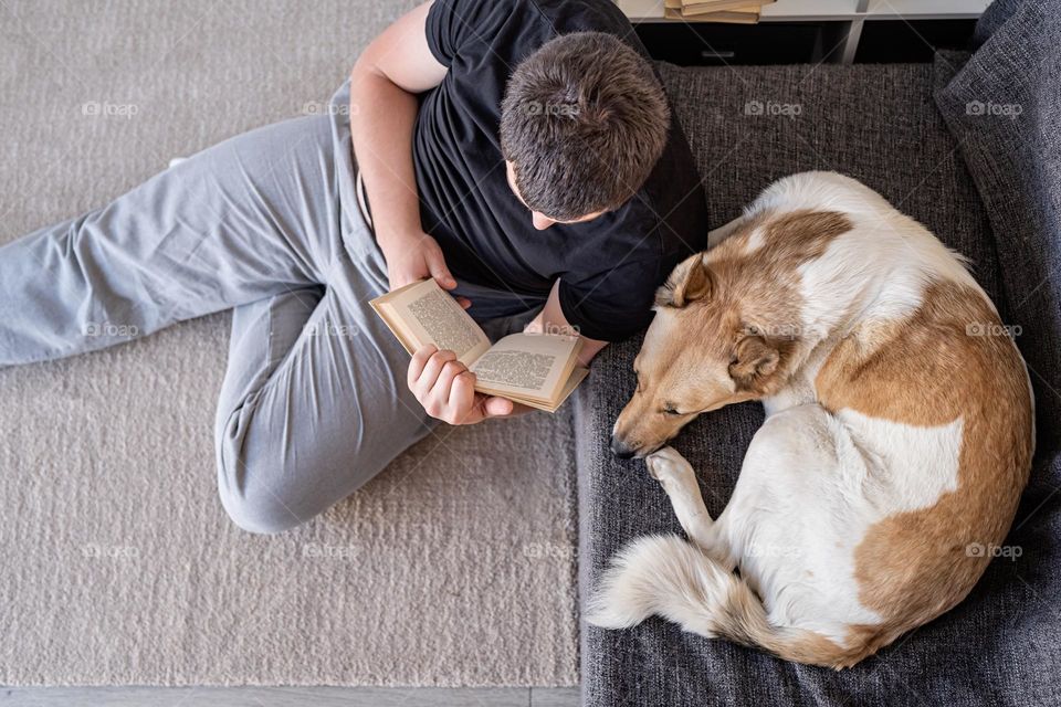 man and dog resting