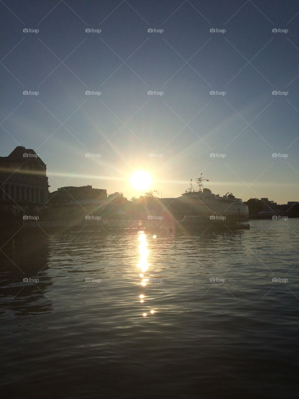 Harbour illuminated by sun rays