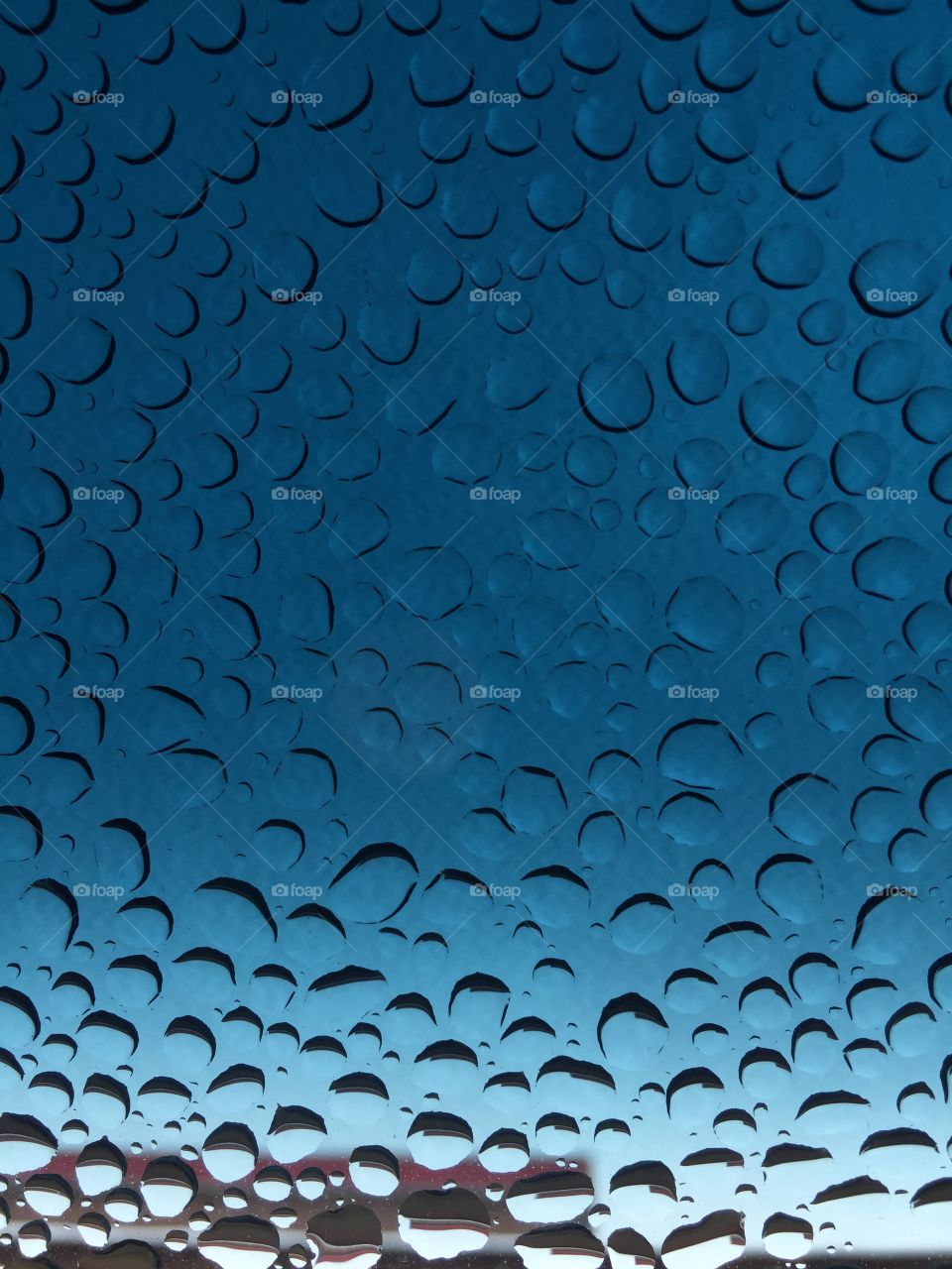 Raindrops on the car window 