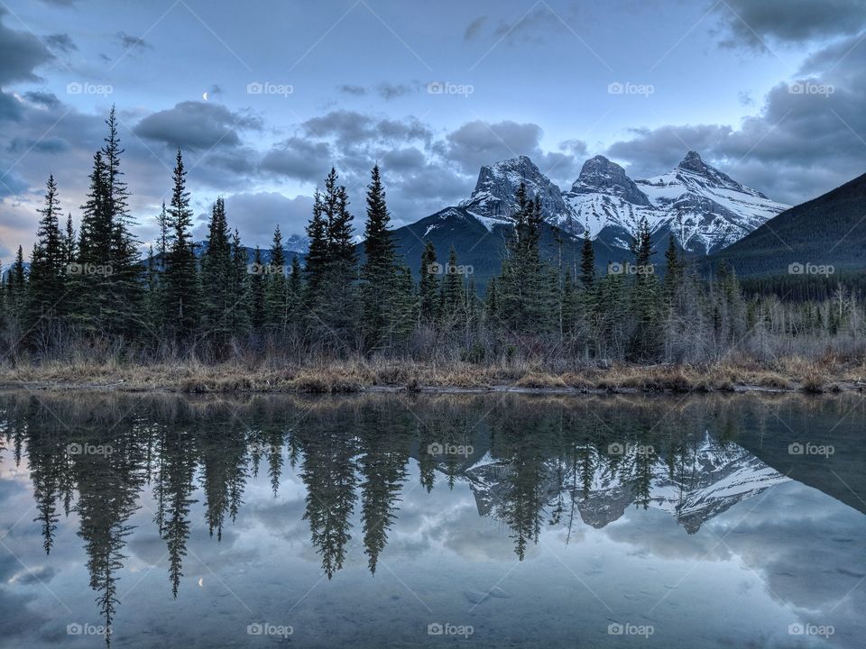 Three sister mountain reflections