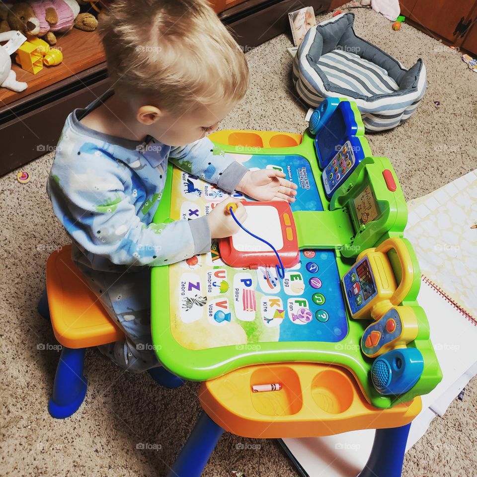 child staying warm and learning while it is cold outside