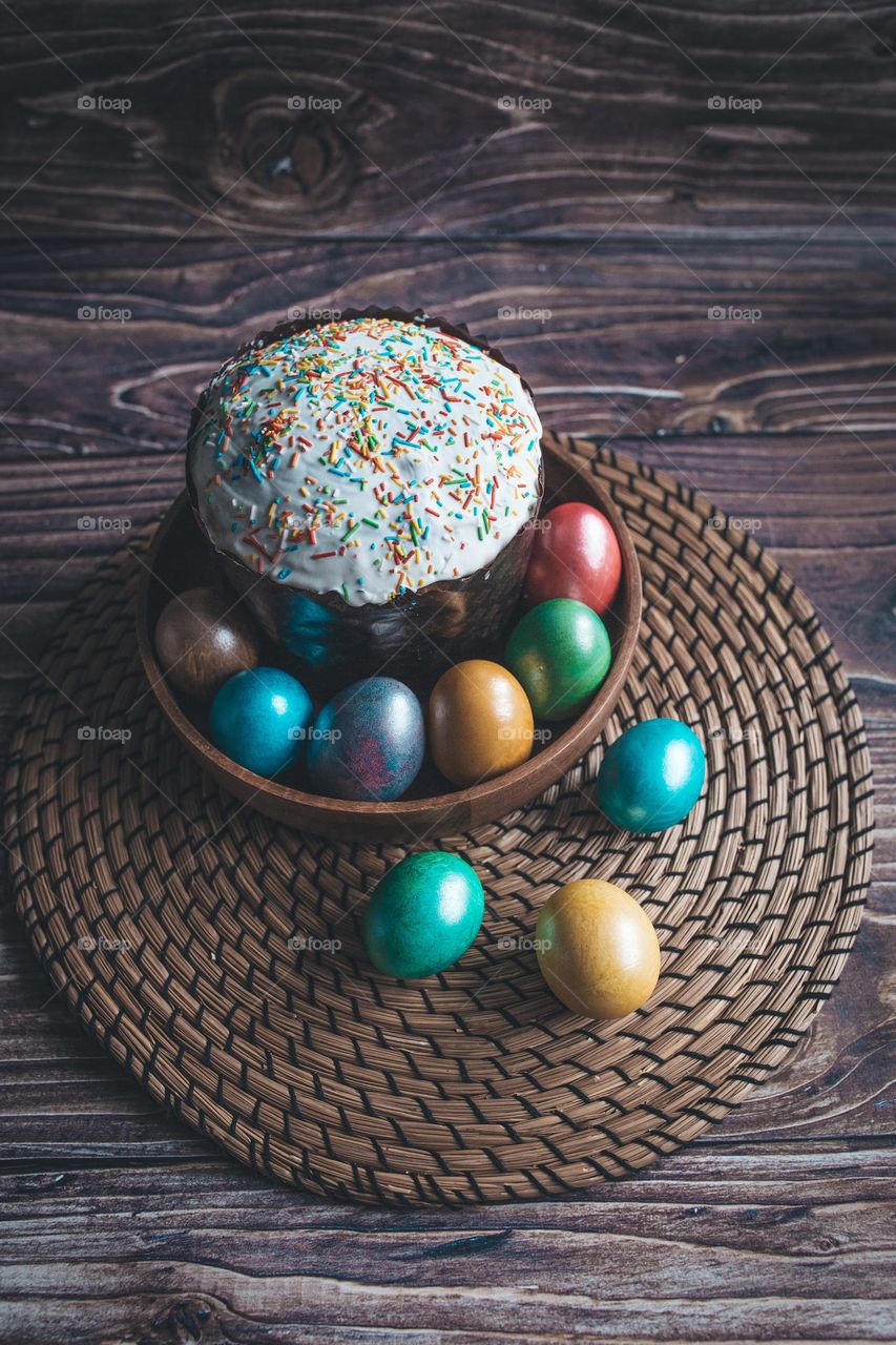 Easter still life Easter colorful eggs, Easter cake on the table