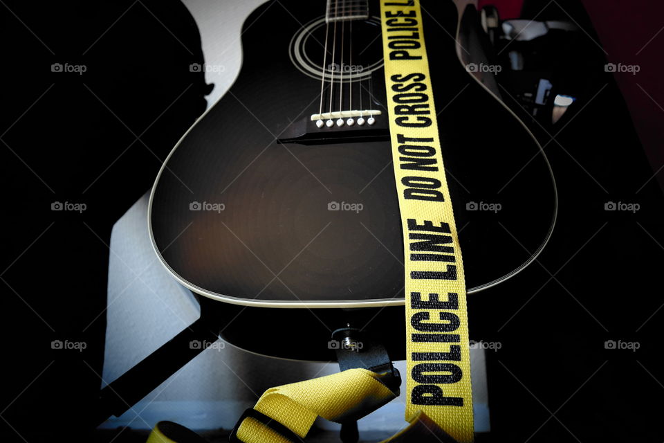 do not cross police line. family guitar