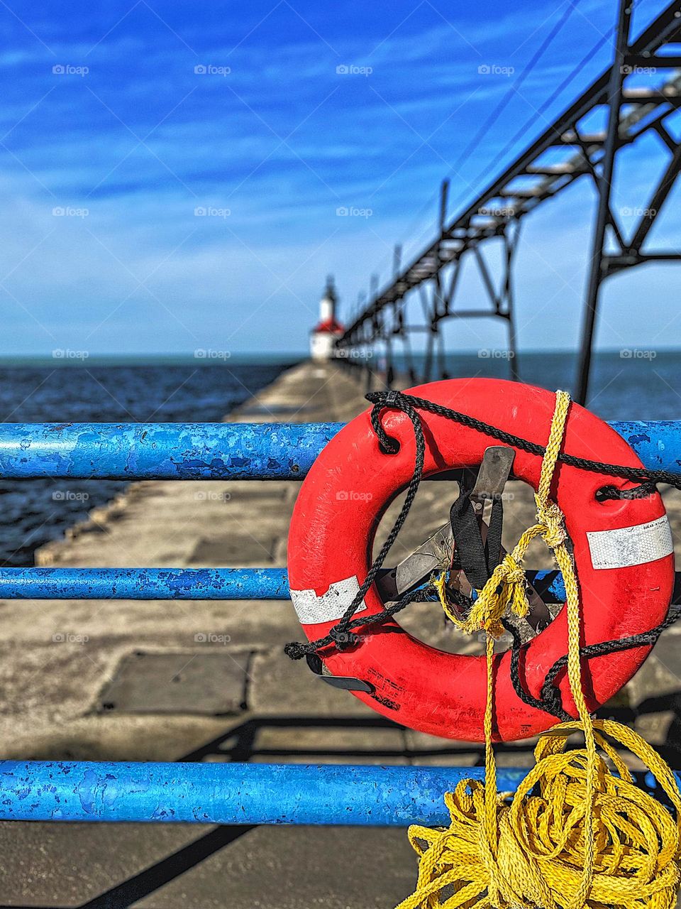 Michigan lighthouse portrait, lifesaver and lighthouse at the the beach, Tiscornia park in Michigan, colorful lighthouse, vacations with family, exploring the parks of Michigan, point of view, brightly colored lifesaver