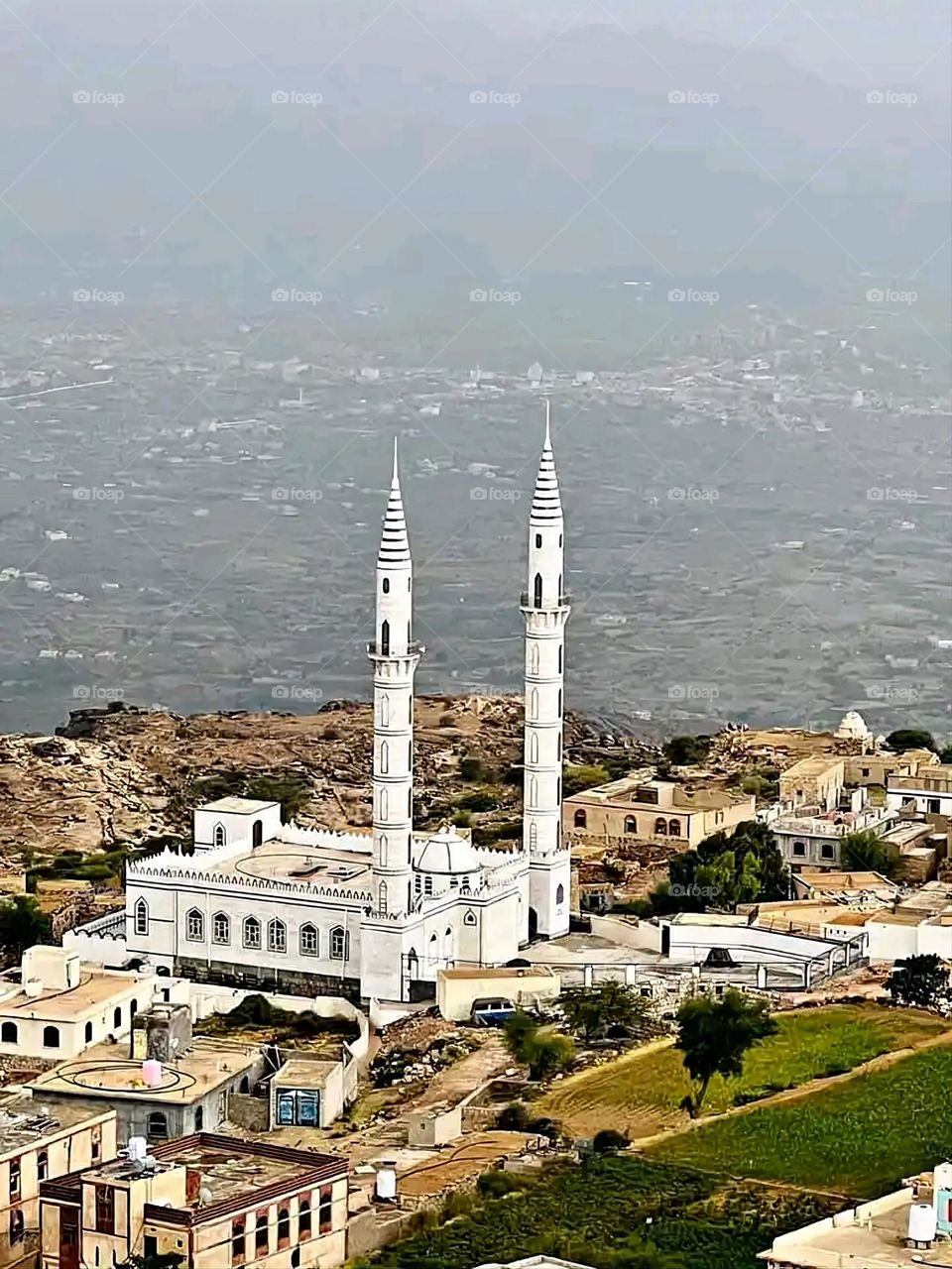 Glory be to God, the magnificent and picturesque view and the natural green trees are a view that is nothing more wonderful than it