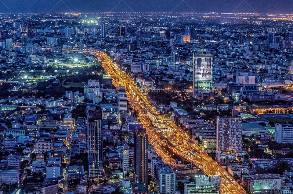 Beautiful night scene of vehicle light on express way in Bangkok city Thailand