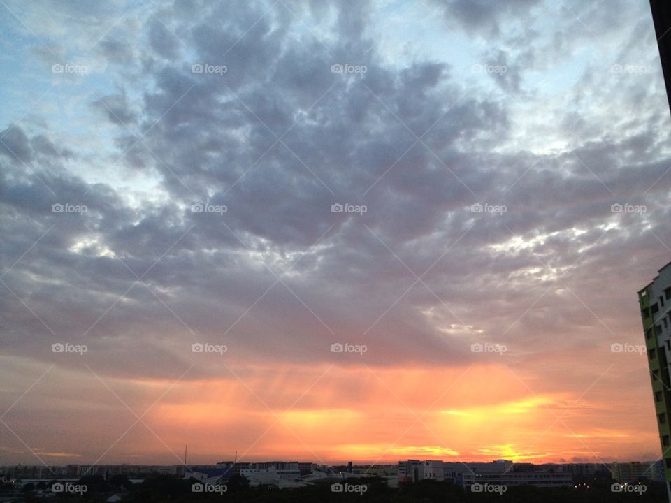 Sunrise with a face in the clouds