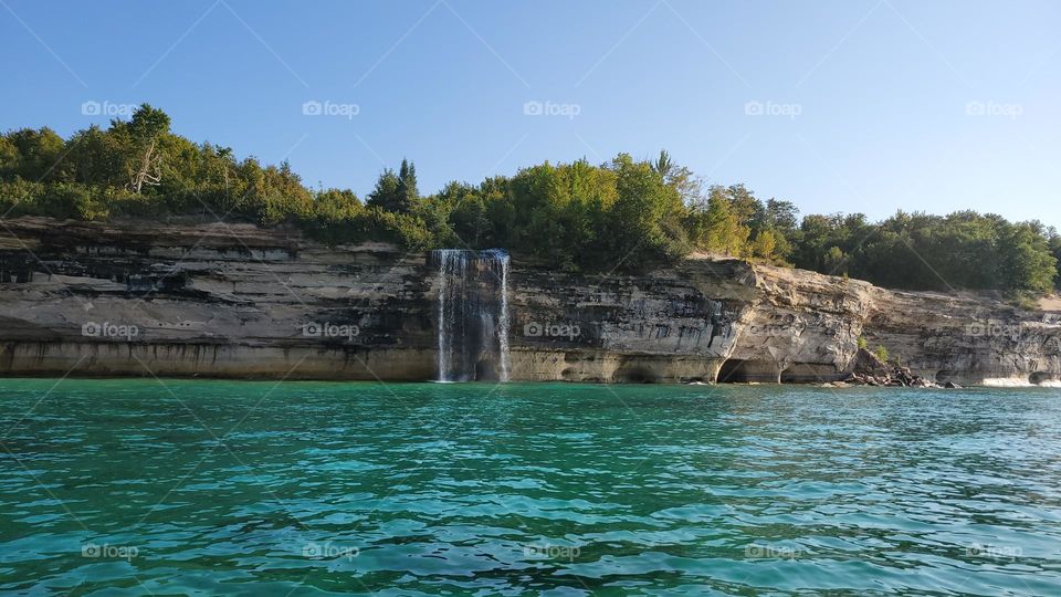 Waterfall into Lake Superior at Pictured Rocks