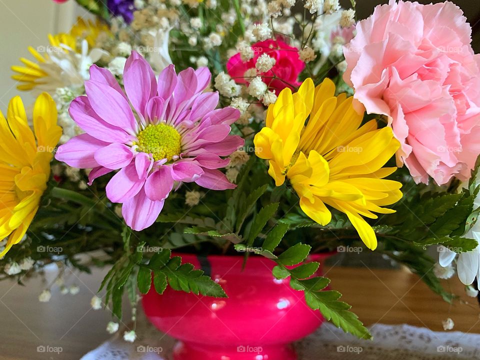 Flowers in pink case