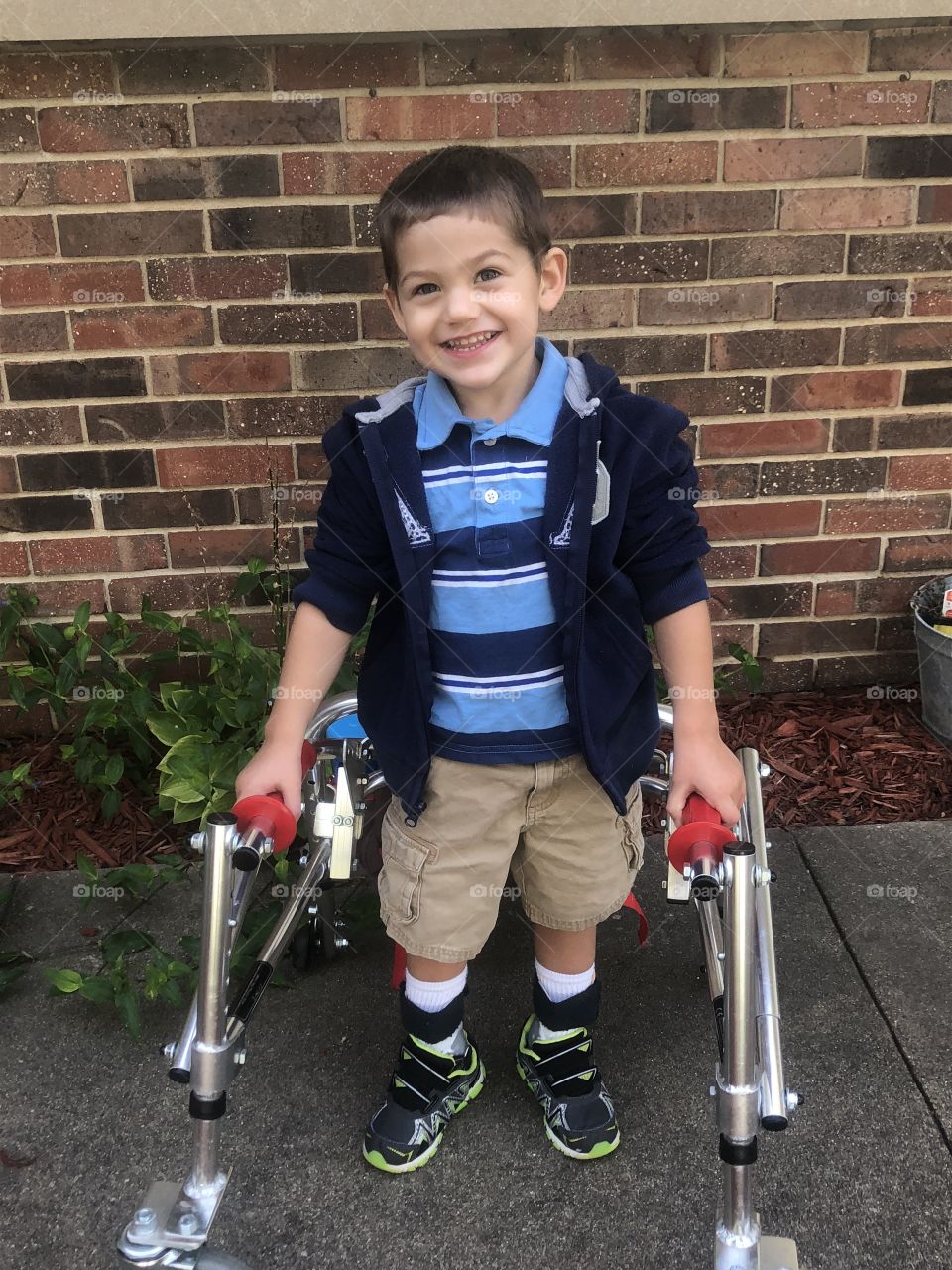Special needs child with walker headed to school