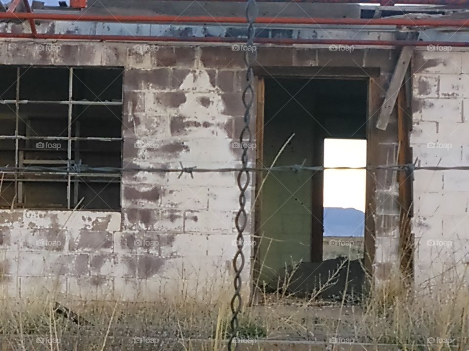 open door from abandoned concrete building