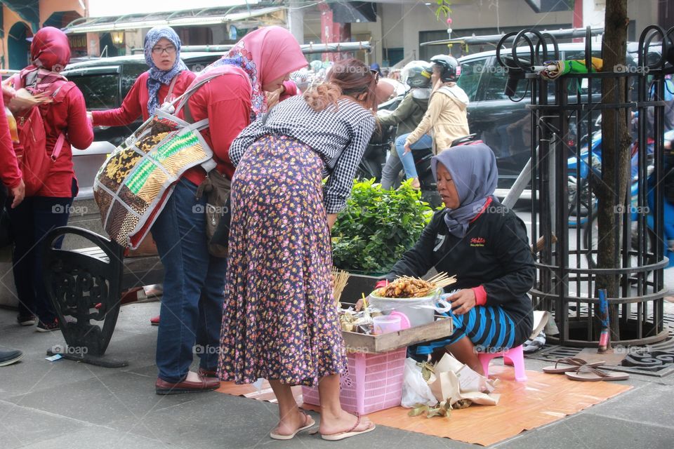 People buy a satay at Malioboro Yogyakarta