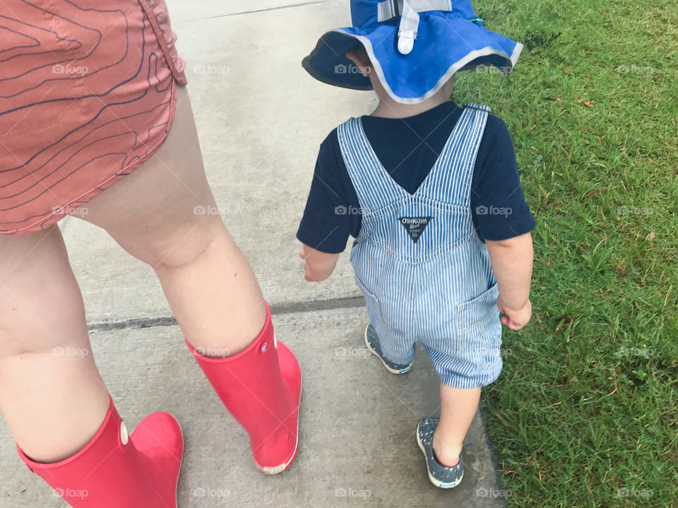 Walking through the puddles with mom