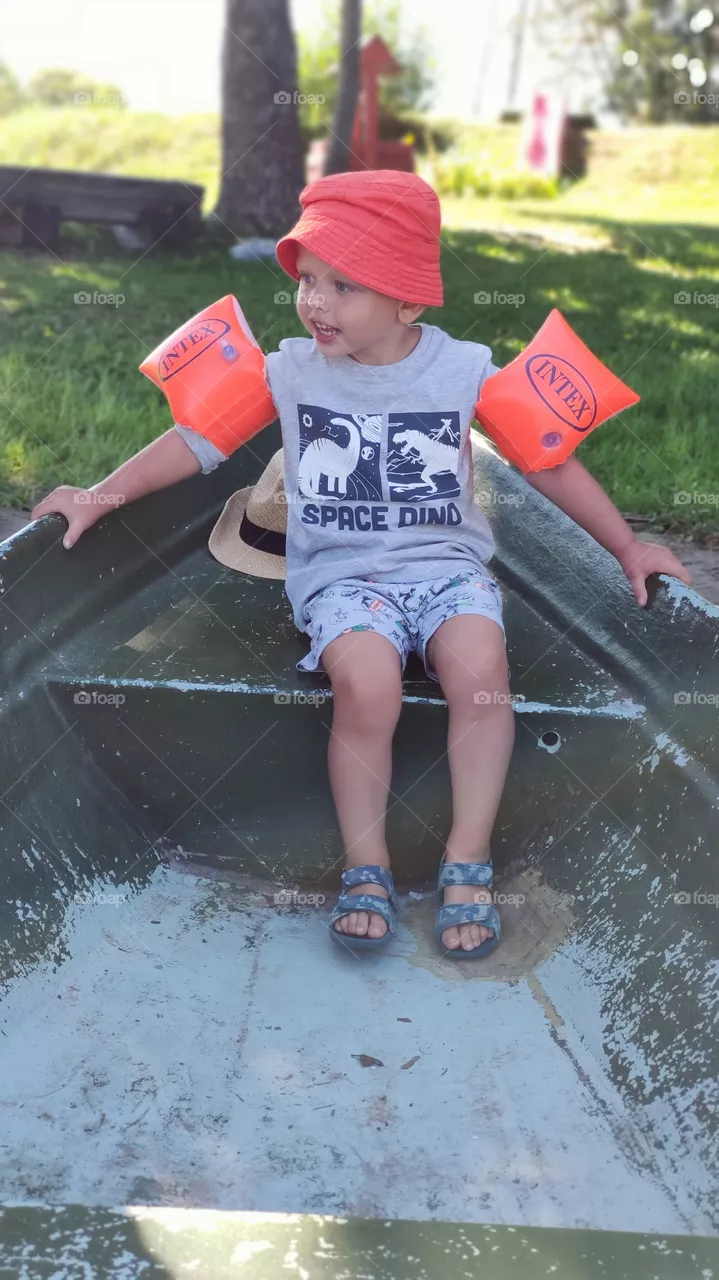 Kid on a boat