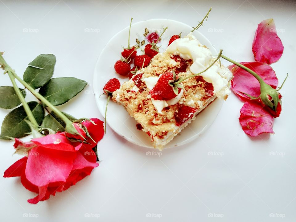 delicate creamy raspberry cake and rose