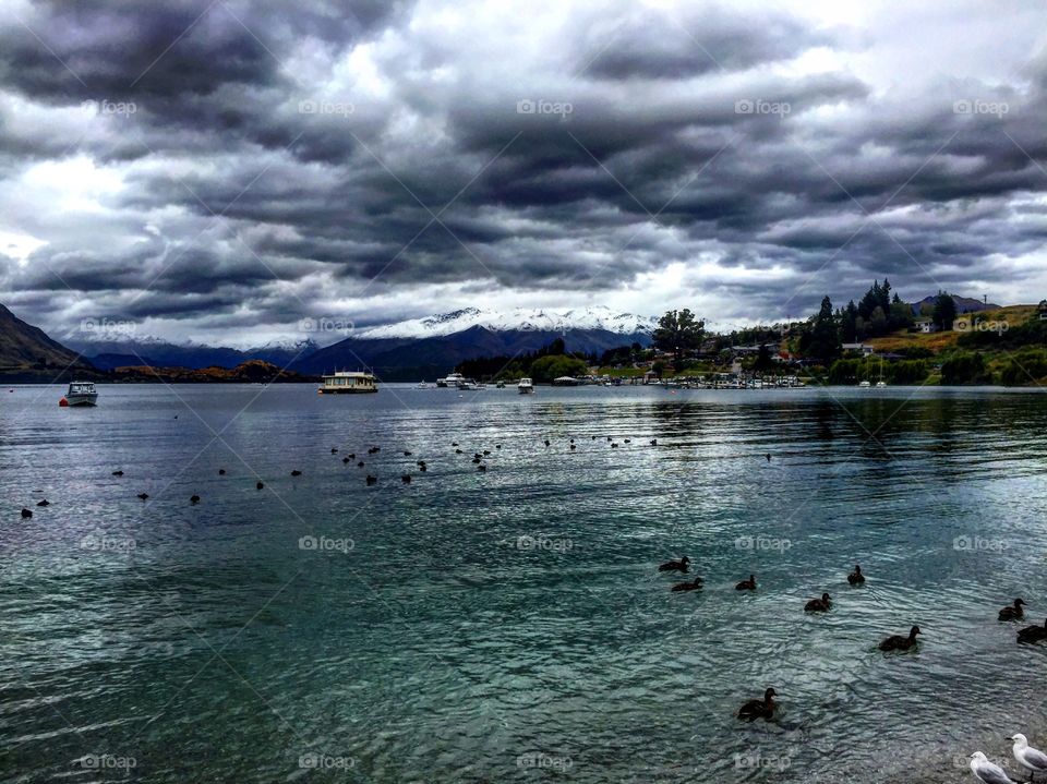 Storm clouds and snow over wanaka, New Zealand