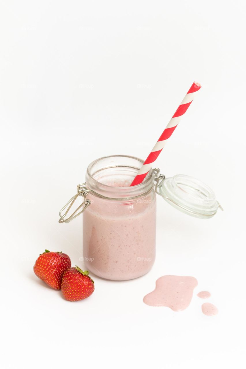 Glass jar with smoothie or milkshake 