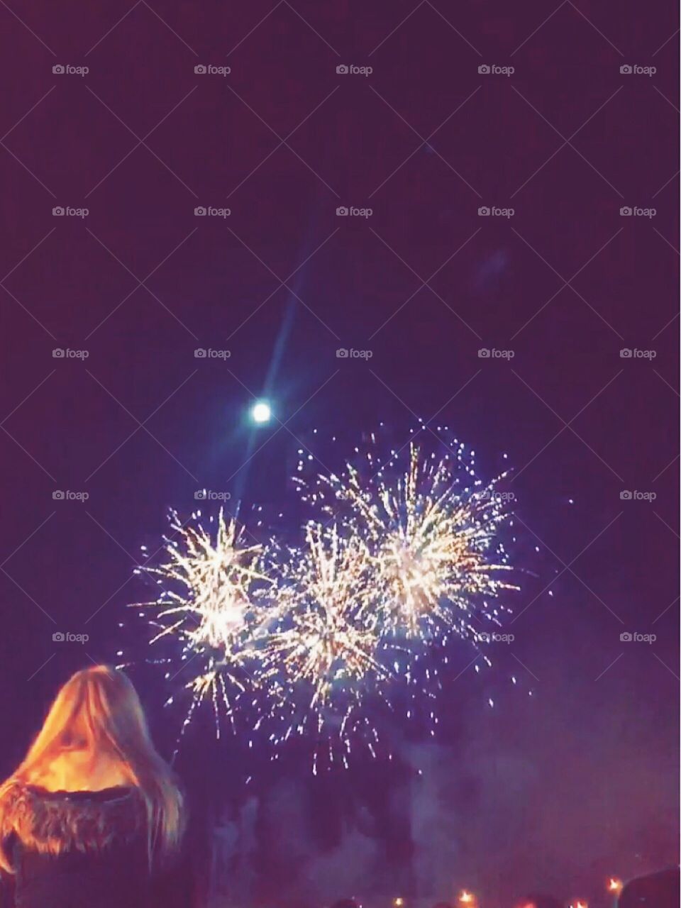 Child gazing on bonfire night 