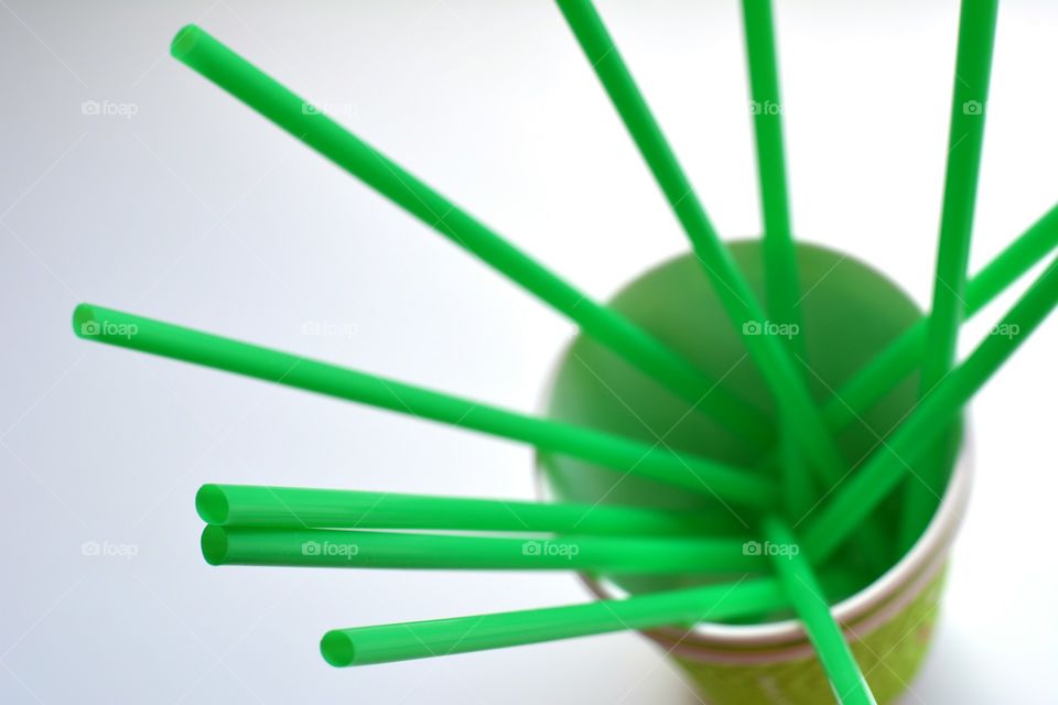 Drinking straw in the glass