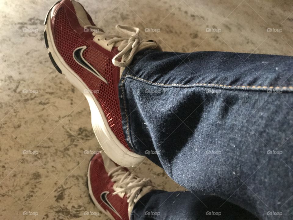 Red Nike Jogging Shoes And Jeans