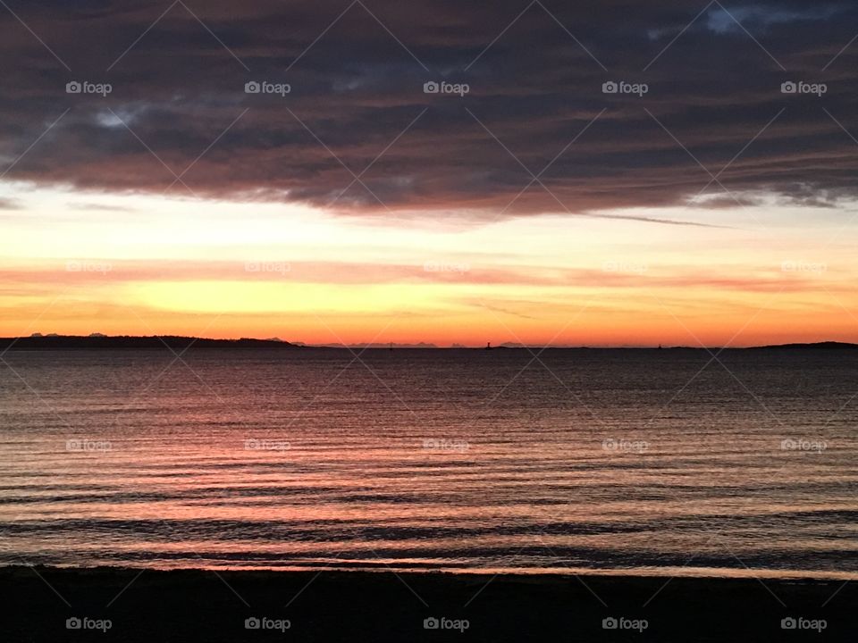 Dramatic sky reflecting on lake