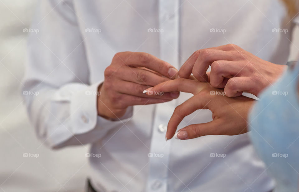 Close-up of couple getting married