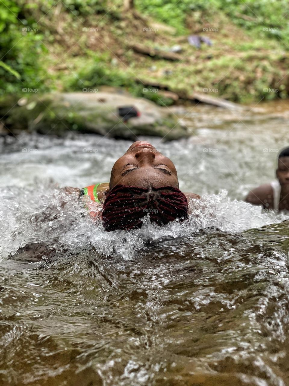 Dipping your head in the water to cool off your head another special kind of feeling