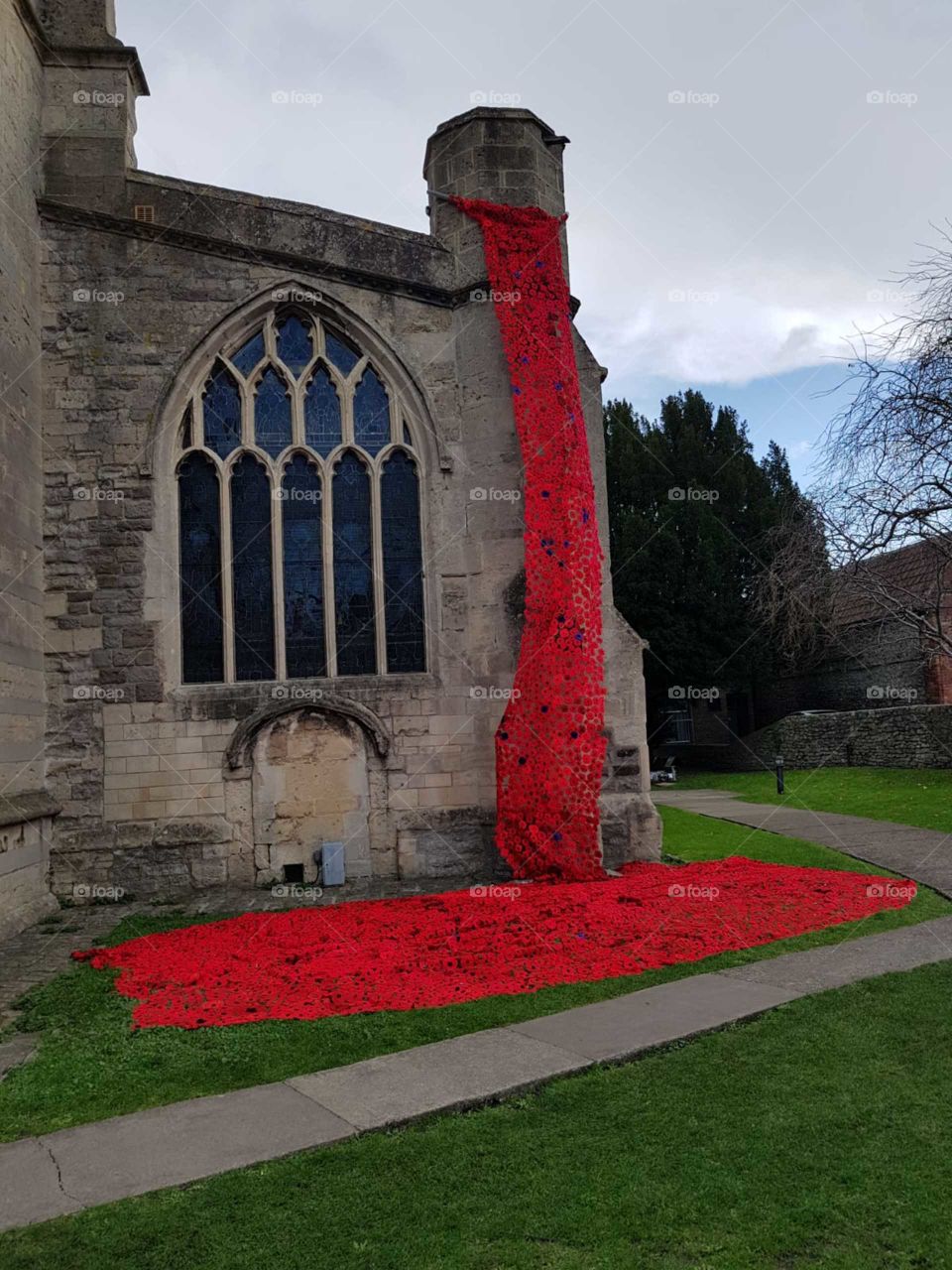St John's church with a display of poppies for remembrance sunday