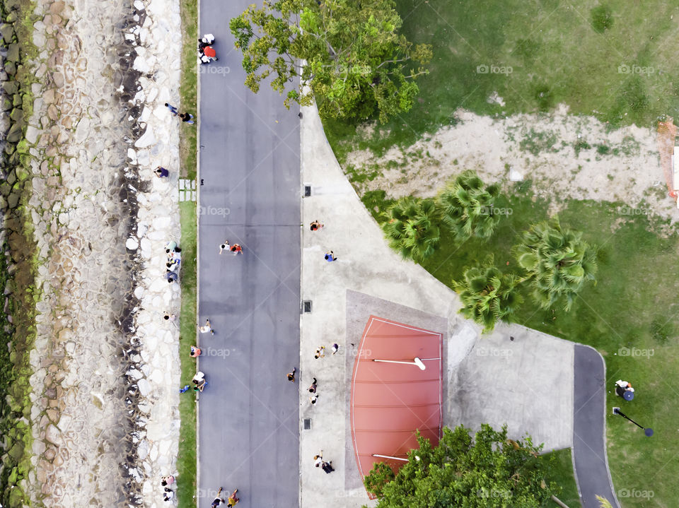 Bird eye view in the park showing footpath and river bank.
