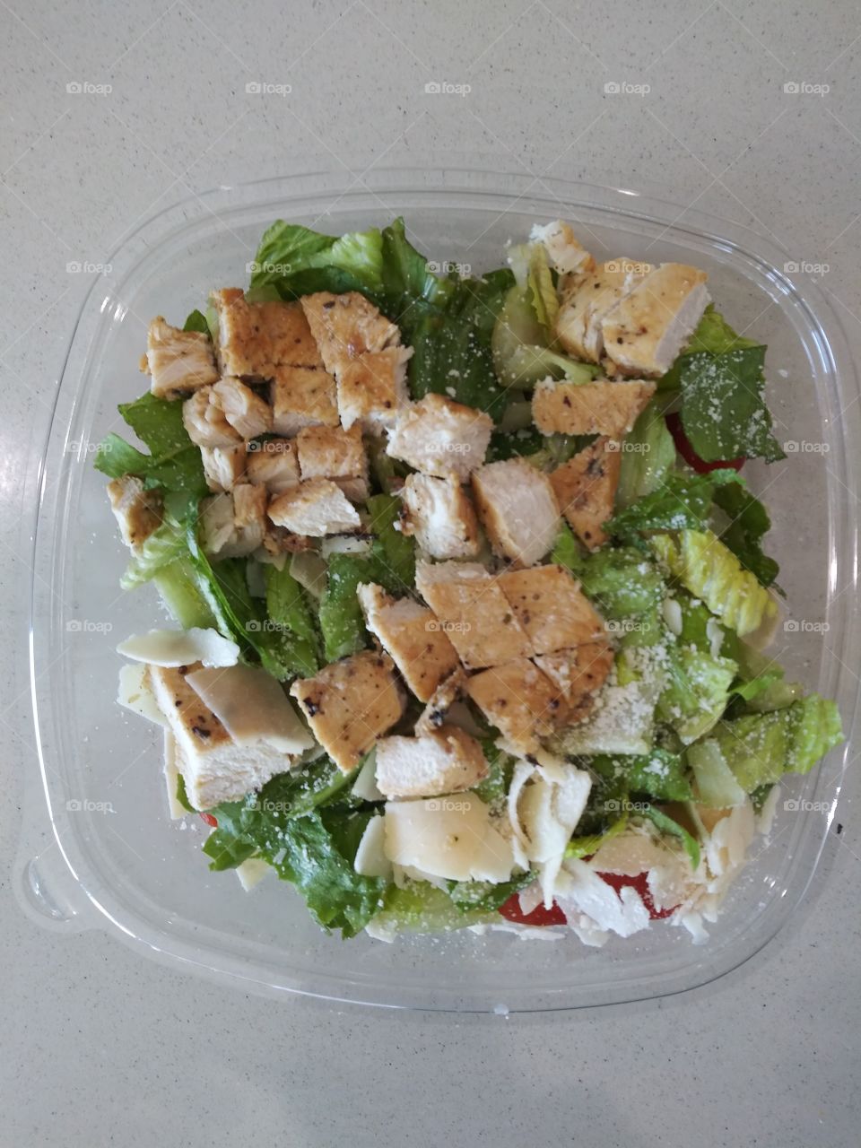 Wendy's parmesan caesar chickensalad is made using chopped romainelettuce, grape tomatoes and an all-white meat, grilled chicken breast. The new go-to fast food caesar salad is topped with a blend of asiago,parmesan and romano cheese,parmesan crisps
